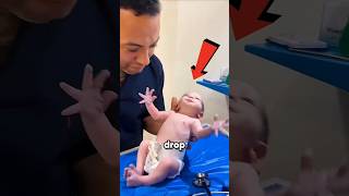 Doctors aren’t dropping babies… it’s a newborn reflex test 👶⚡ #NewbornReflex #MedicalFacts #shorts