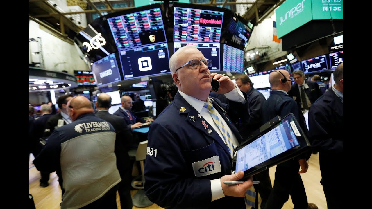 Wall St drops on worries over China, oil prices newspaper mockup
