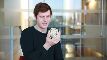 Using exotic hyperbolic geometries to make quantum computers robust against noise