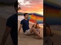 Suddenly, a giant, colorful beach umbrella sprouts beside the man. #beach #beachlife #youtube