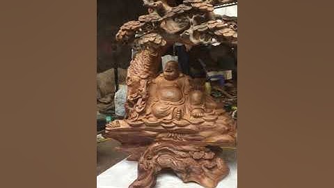 Di lặc ngồi cây tùng gỗ ngọc am hà giang ( giá 6 triệu )