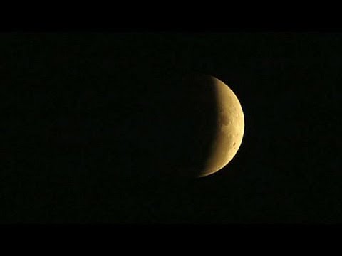 Millions in Americas and Australasia gaze at full lunar eclipse