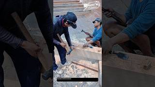 Mastering Hull Framing: Hand-Carved Beam Fitting Inside a Wooden Boat.