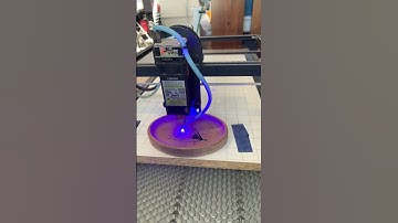 Longer Ray5 Engraving the bottom of a small bowl.