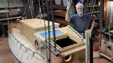 Tacking down the coach roof.