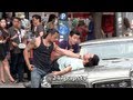 Taylor Lautner gets SLAMMED on top of a car while Filming in NYC (06-24-13)