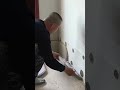 the process of installing a material on a wall to make it look better#trending