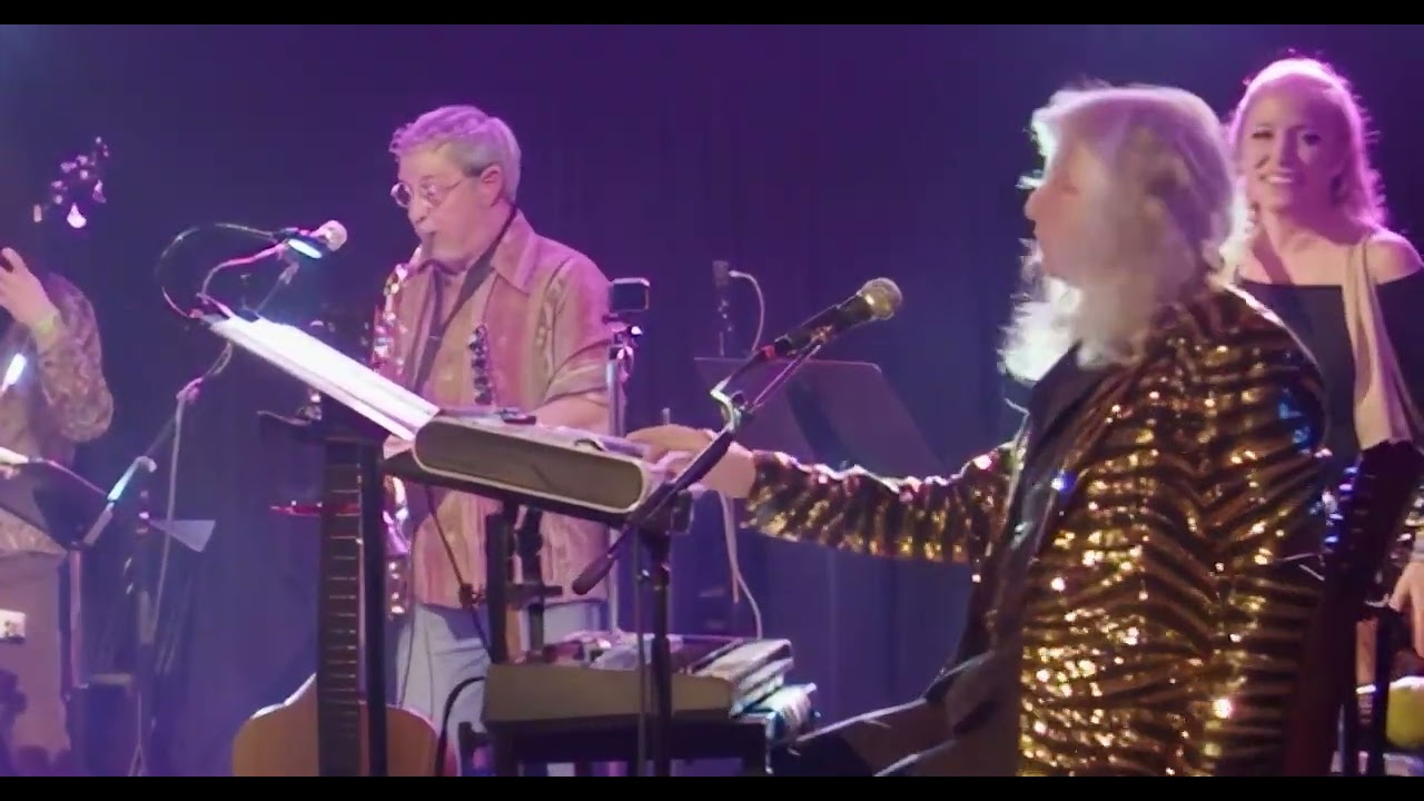 By George (Harrison) band - "It Don't Come Easy"