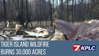 Gov. Edwards flies over Tiger Island Fire as damage exceeds 30,000 acres