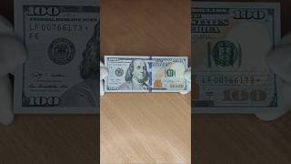 Цена банкноты 100 долларов серии 2009 А года. F. Атланта. Серия замещения со звездой. США.