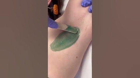 Professional waxing of short under arm hair using hard wax from nacach #esthetician #waxing