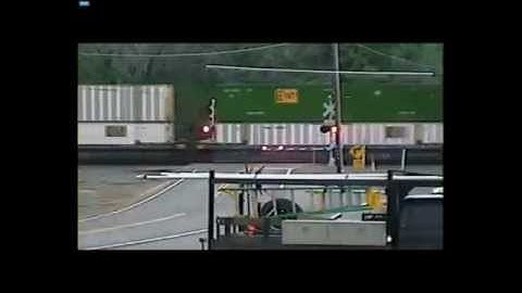 Stupid Driver Runs Around Crossing Gates and Misses Train by Seconds