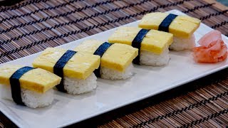 This video will show you how to make tamago sushi. sushi rice topped
with sliced tamagoyaki (rolled omelet) and wrapped around a strip of
nori seaweed. ...