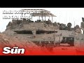 Sun rises over Israeli tanks deployed near Gaza border