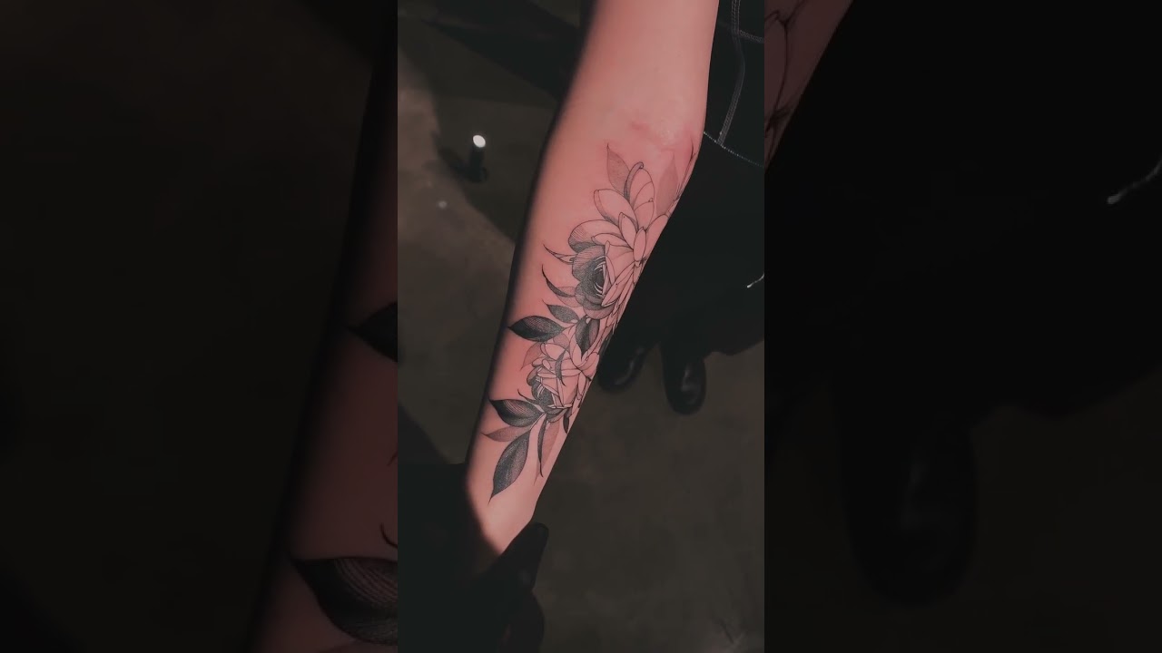 Cool botanical tattoo by Arty