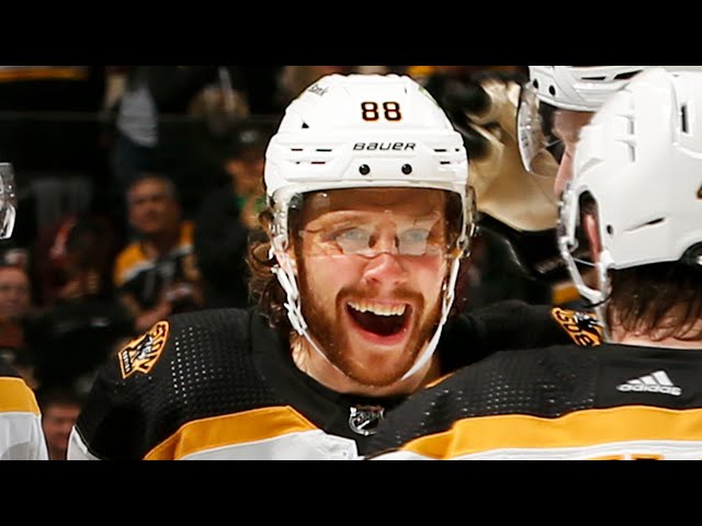 Man of style David Pastrnak wears pink sunglasses, scores hat