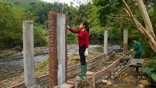 Build an automatic water wheel - Build pillars and add iron wait for the water trough to be poured