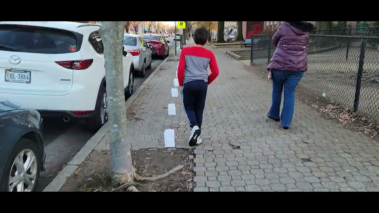 Bags Of Candles On The Sidewalk.