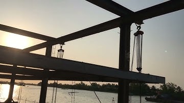 Cẩu lắp thùng chụp . Phương pháp thi công cầu rạch miễu 2