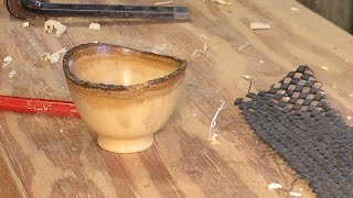 Richard Raffan turns a tiny bark rim bowl from what should have been firewood