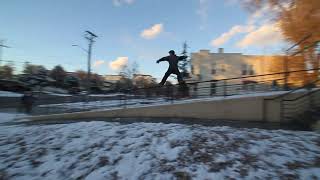 Skier grinds rail and gets caught on chain (First Angle)