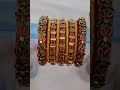Skill thread bangles red with gold...