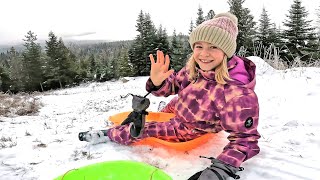 Kids ski and sled on the Tipsy Moose Luge