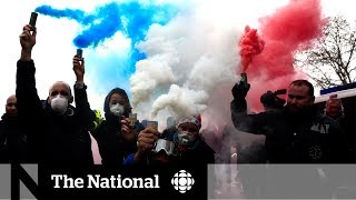 French government gives in on fuel-tax hikes in the face of heightened protests