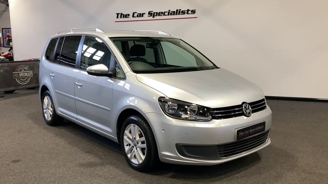 Silver VW Touran 7-seater used, fuel Diesel and Automatic gearbox, 182.000  Km - 17.450 €