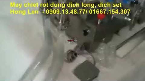 máy chiết rót dầu ăn 2 đầu, máy chiết rót thuốc thú y, thuốc thủy sản, máy chiết rót dịch lỏng