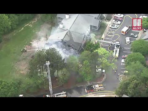 Gwinnett firefighters on scene of apartment fire - YouTube
