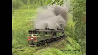 Smoking Diesel Train Coming Out Of Tunnel