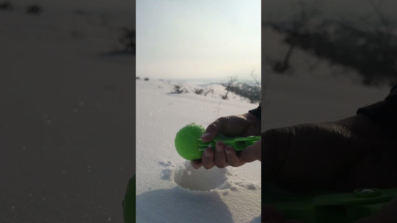 A beautifulA wonderful snowball made of pure white snow turned out. 