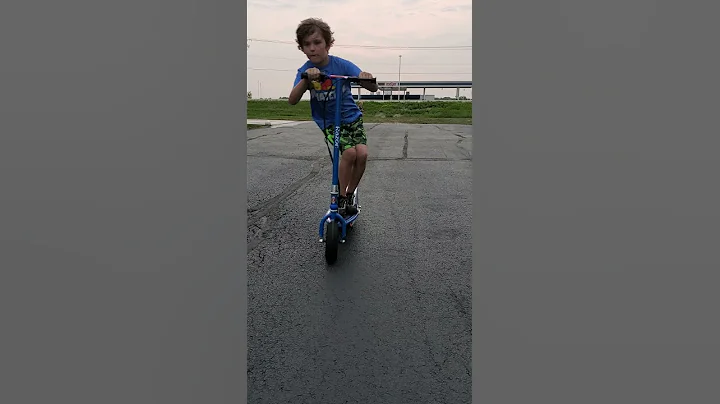 my crazy kid trying to kill me on his scooter