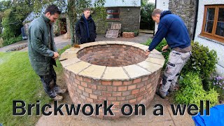 Bricklaying building a well!