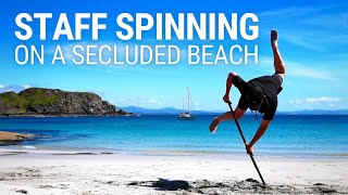 Staff Spinning on a Secluded Beach