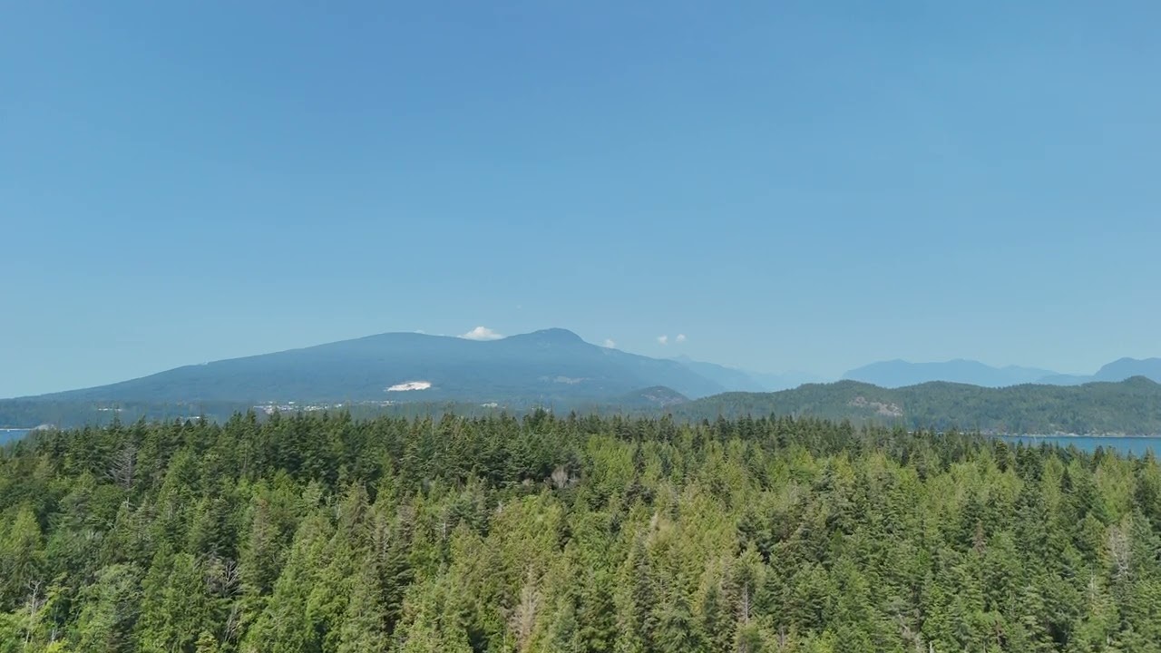 Flying Over Pasley Island Near Bowen Island, Revealing Mountainous Scenery | 4K Drone Footage