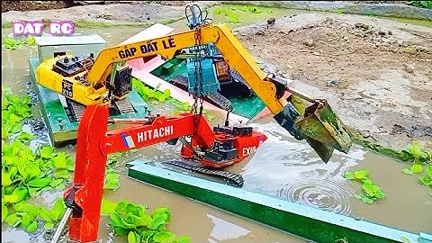 Tài xế nữ múc chìm xe HITACHI EX60 -3 /tiến hành bơi phà trục vớt HITACHI bị chìm