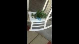 Very simple steps to make an amazing Patio/Porch Planter. The chair cost $2.00 at a garage sale. Additional supplies: white paint, 