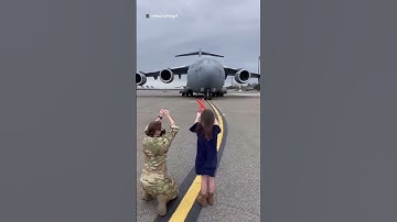 Thumbnail of After 20 years of service, little girl marshals her dad in on his last flight