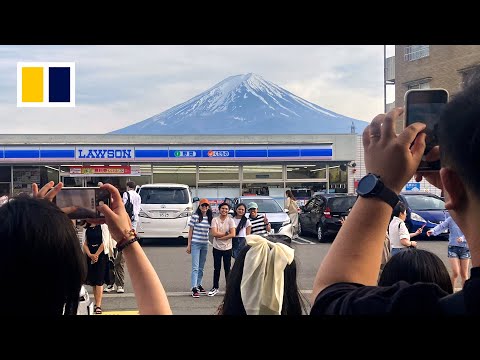 Видео: Mount Fuji views blocked to deter tourists