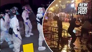 Information China vows to ‘crack down’ as protesters clash with riot cops in hazmat suits | New York Post Guide