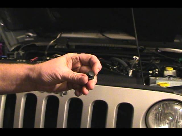 How to Replace Headlight Bulb on Jeep JK Wrangler 2008 (2007-2012) - YouTube