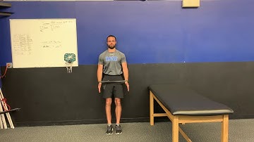 Back To Wall Shoulder Flexion Thumbs i To Wall w/ Band Around Wrists
