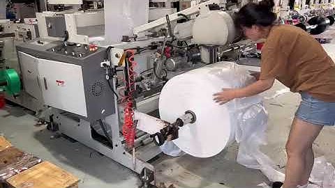 HP-RD-H feeding process of the draw tape garbage bag making machine