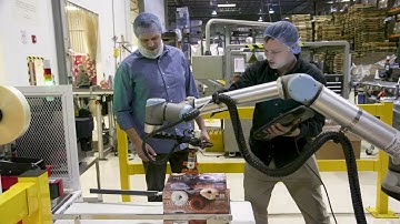 Case Study | Napco Brands: 15% throughput increase using UR robots and Robotiq Palletizing Solutions