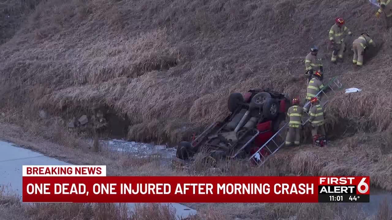 1 dead, 1 injured after vehicle crashes, lands upside down in Omaha ...