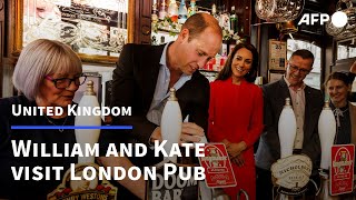 Prince William and Kate pop into the Dog & Duck pub in Soho | AFP