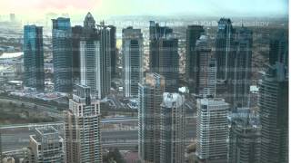 Morning in Dubai Marina with towers and traffic on road from skyscrapper, Dubai, UAE timelapse 4K