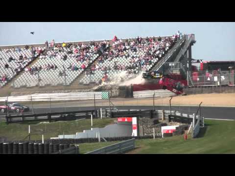 ONLY ONE CAUGHT ON CAMERA. massive crash and roll, one of the worst crashes I have ever seen, during the second mr2 race at the 750mc meeting, 17th April 2011. Cars 1 and 55 slam into the barrier and both are launched into a series of rolls, with Andrei Bgartov (55) landing upside down in the spectator area at the top of paddock hill bend. The speed at which the two left the track was unbelieveble, an extremely nasty accident. www.derekphotography.co.uk